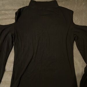 Sexy cold shoulder black top. Size L
